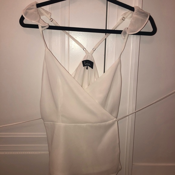 wrap blouse with ruffled shoulder - Picture 1 of 6